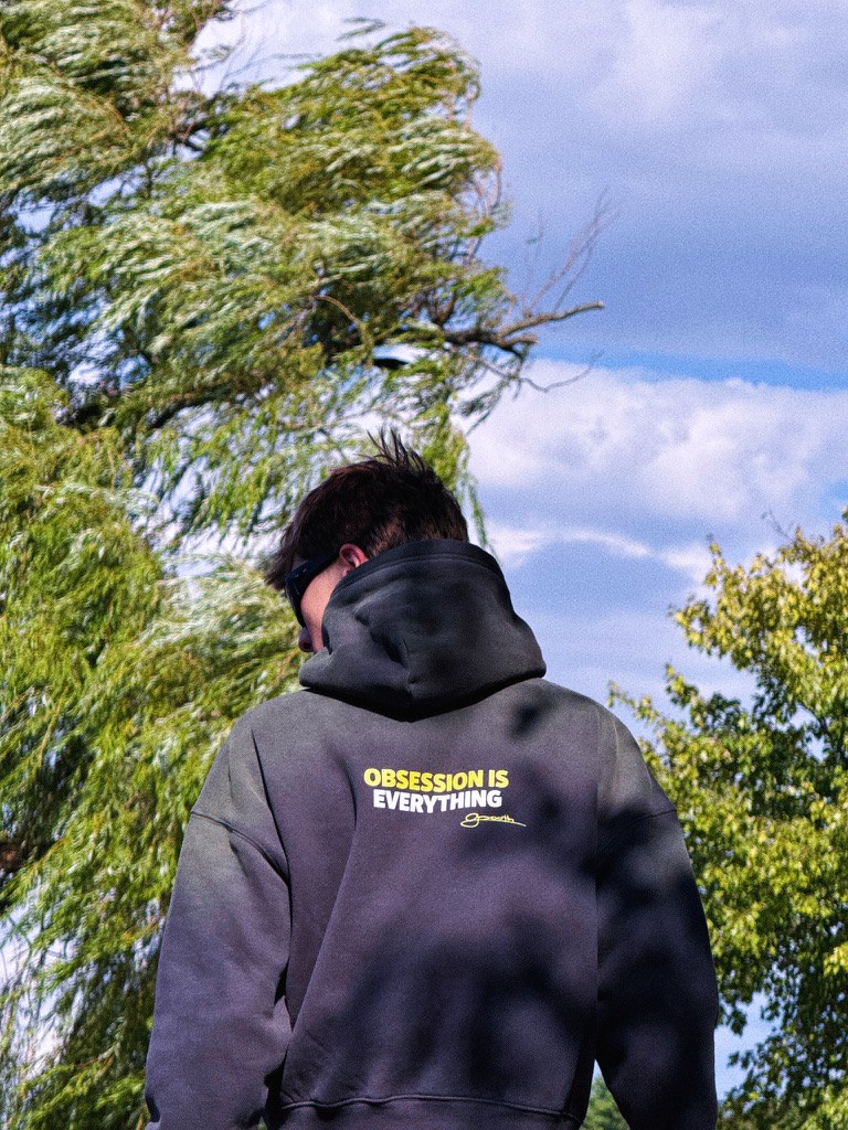 Obsession Is Everything back print on the hoodie