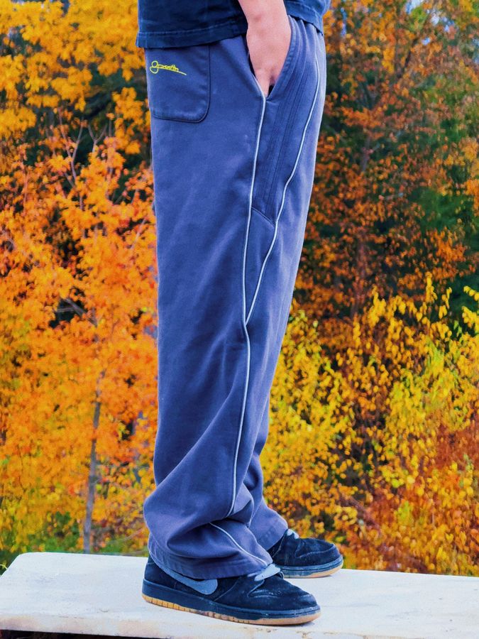 Reflection sweats in front of fall leaves